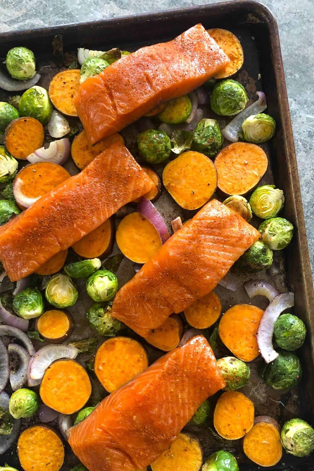 uncooked salmon sheet pan dinner.