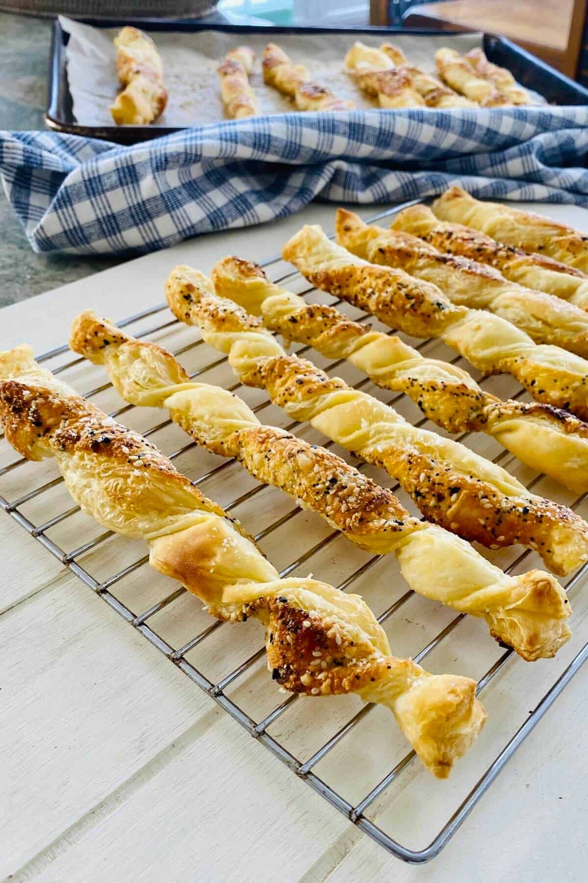 puff pastry cheese twists cooling.