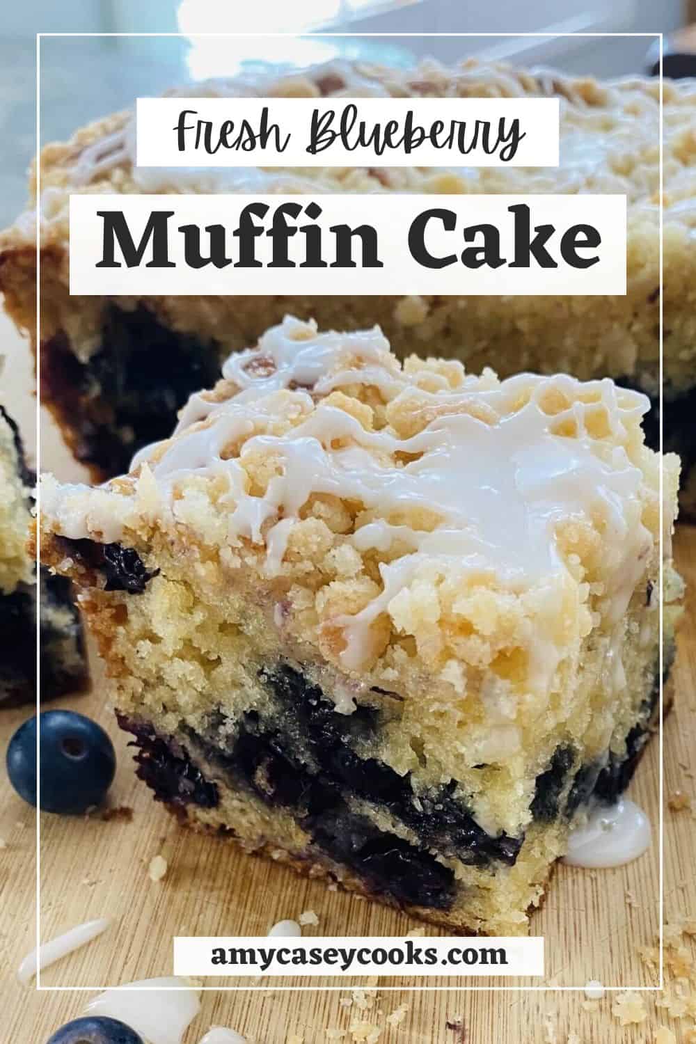 A slice of fresh blueberry cake. on a cutting board.