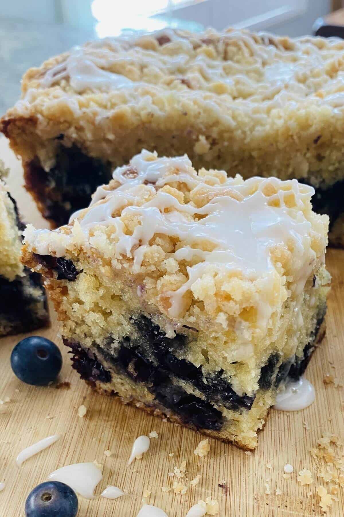 A slice of blueberry muffin cake.