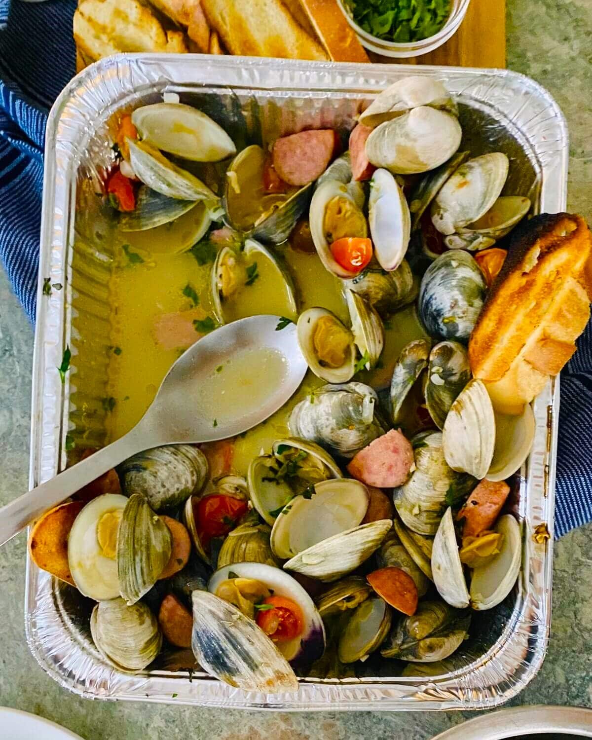 drunken clams in a foil pab.