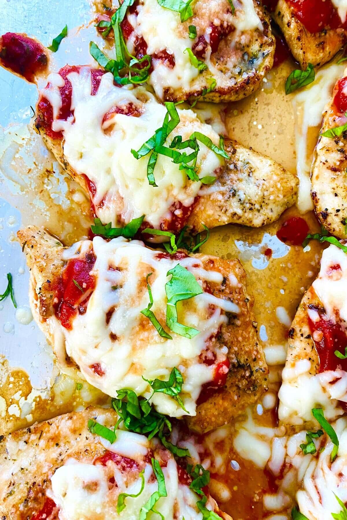 keto chicken parmesan on a baking sheet.