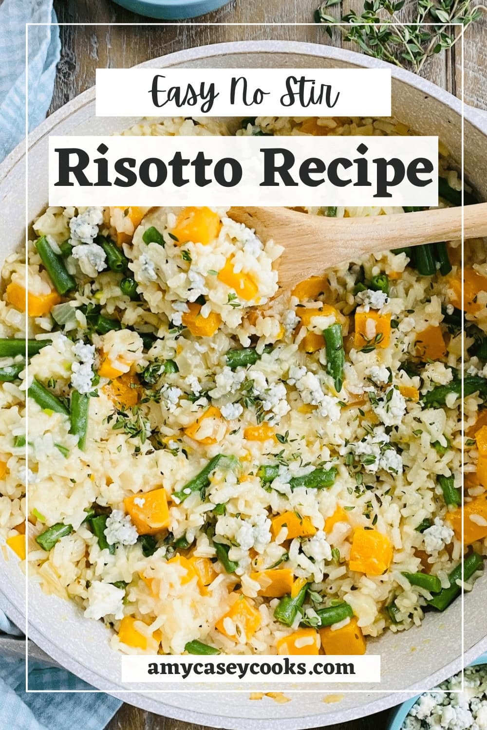 risotto with green beans on a wooden spoon.