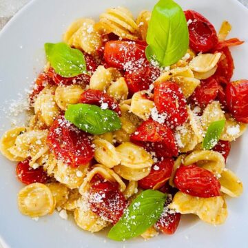 Chunky roasted cherry tomato sauce over pasta.
