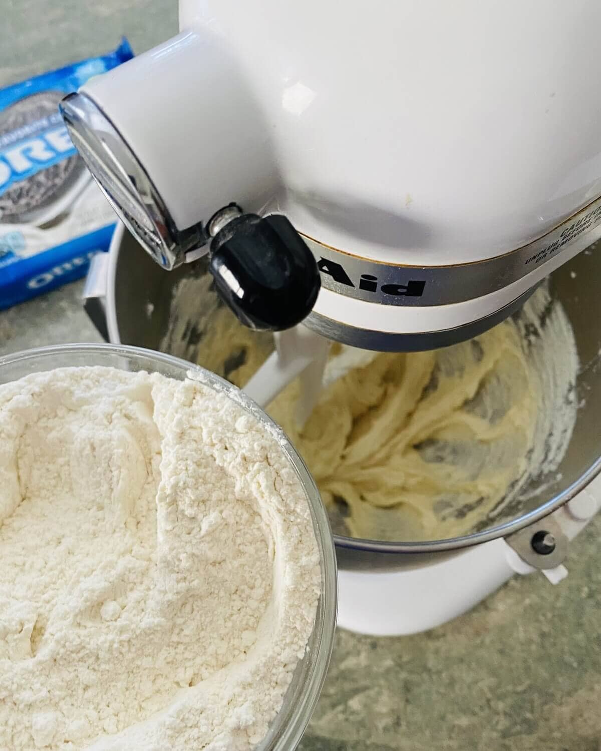 adding dry ingredients to batter.