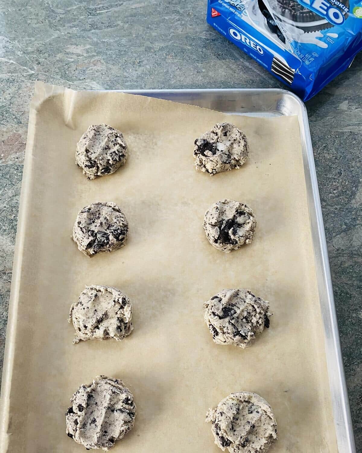 Oreo sugar cookies on a baking sheet.