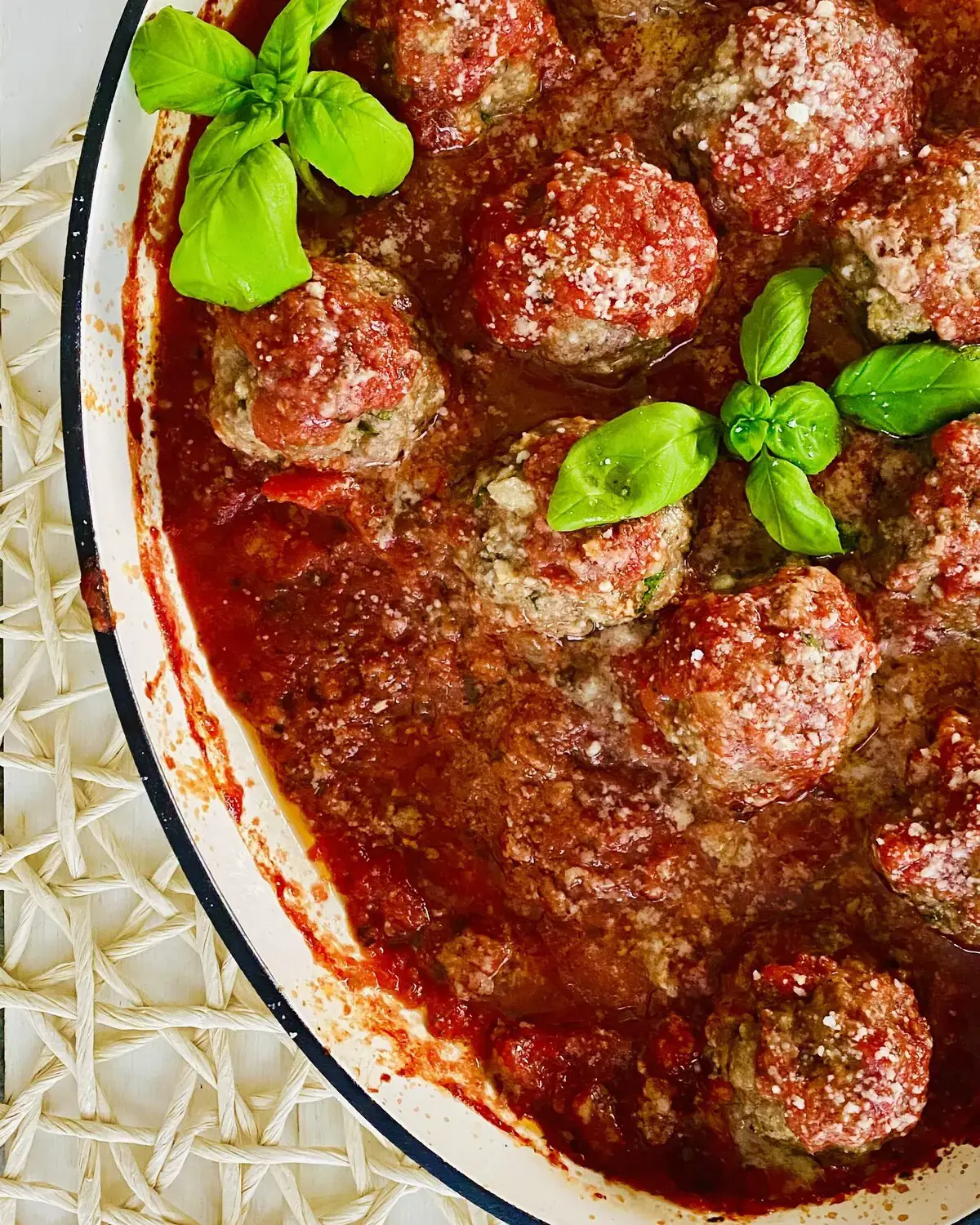 baked meatballs in red sauce.