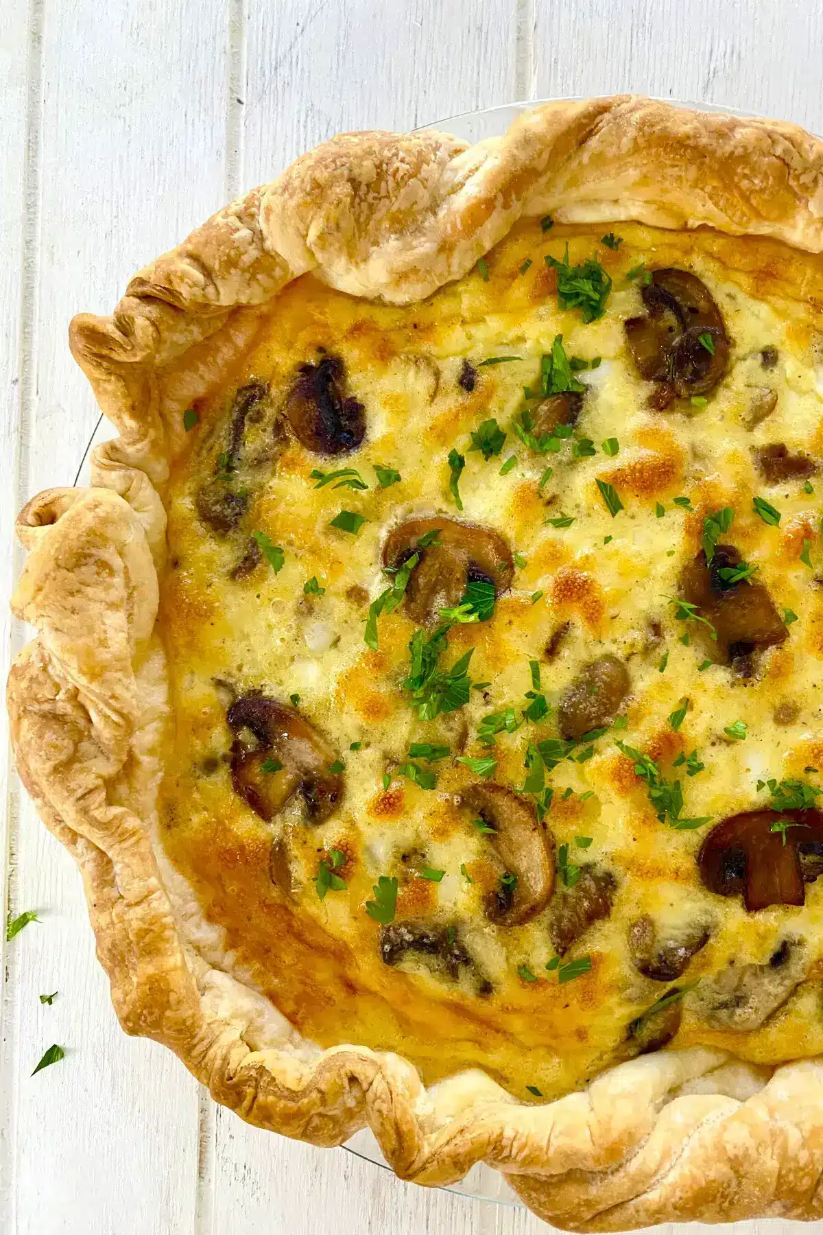mushroom quiche recipe with puff pastry crust.