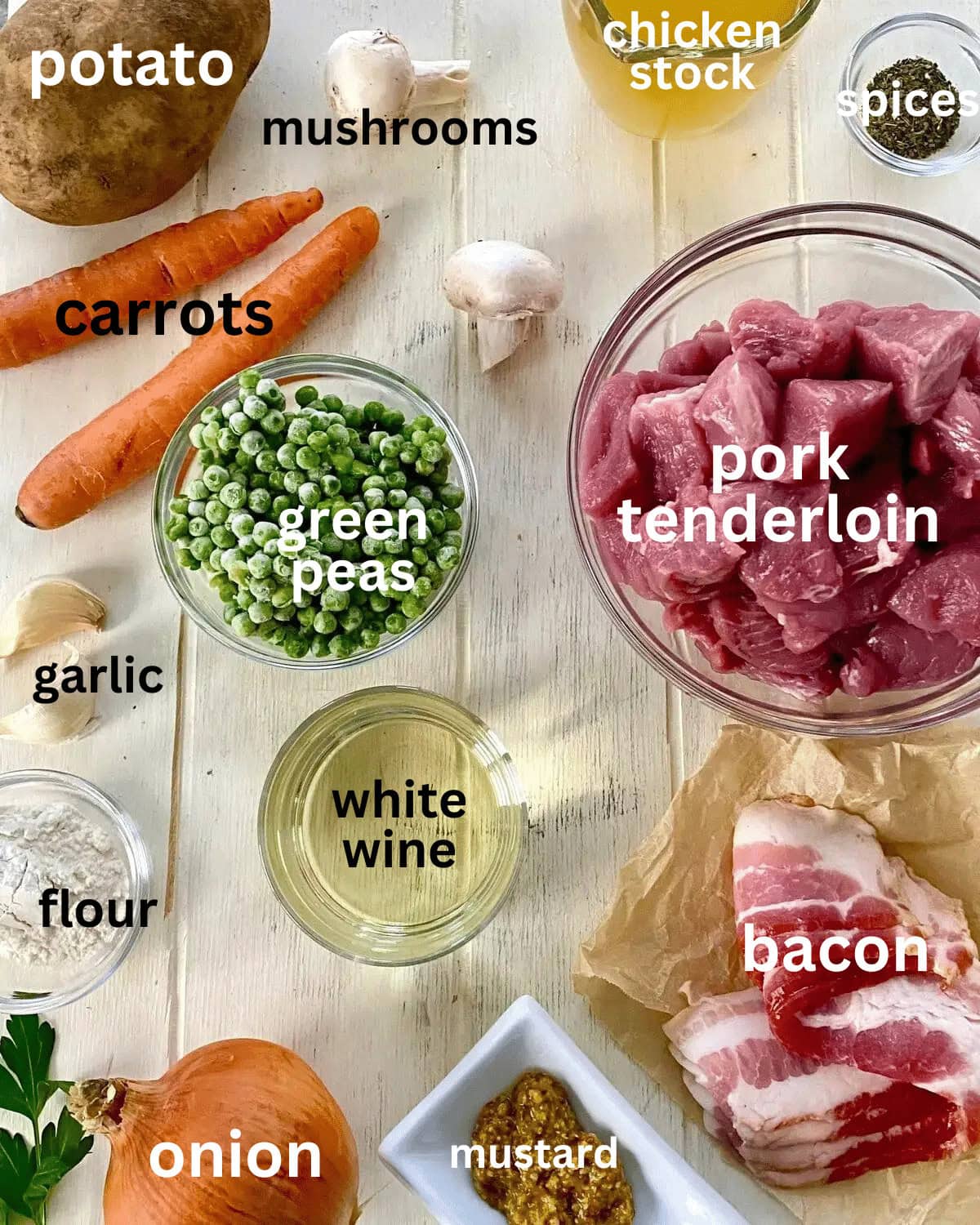 Pork tenderloin cubes, flour, white wine, mushrooms, carrots, potato, garlic, bacon, onion, spices.