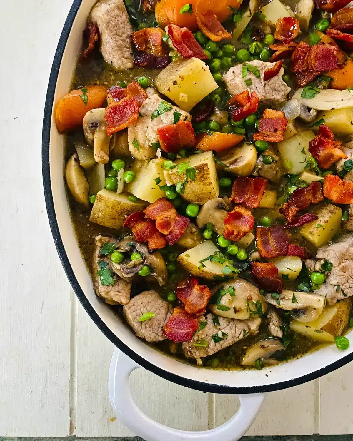 A comfort food one pot dinner with potatoes and carrots.
