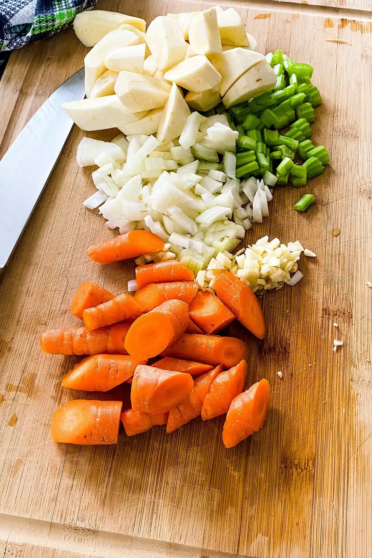 cut up carrots, parsnips, onions and celery for Irish lamb stew with Guiness.