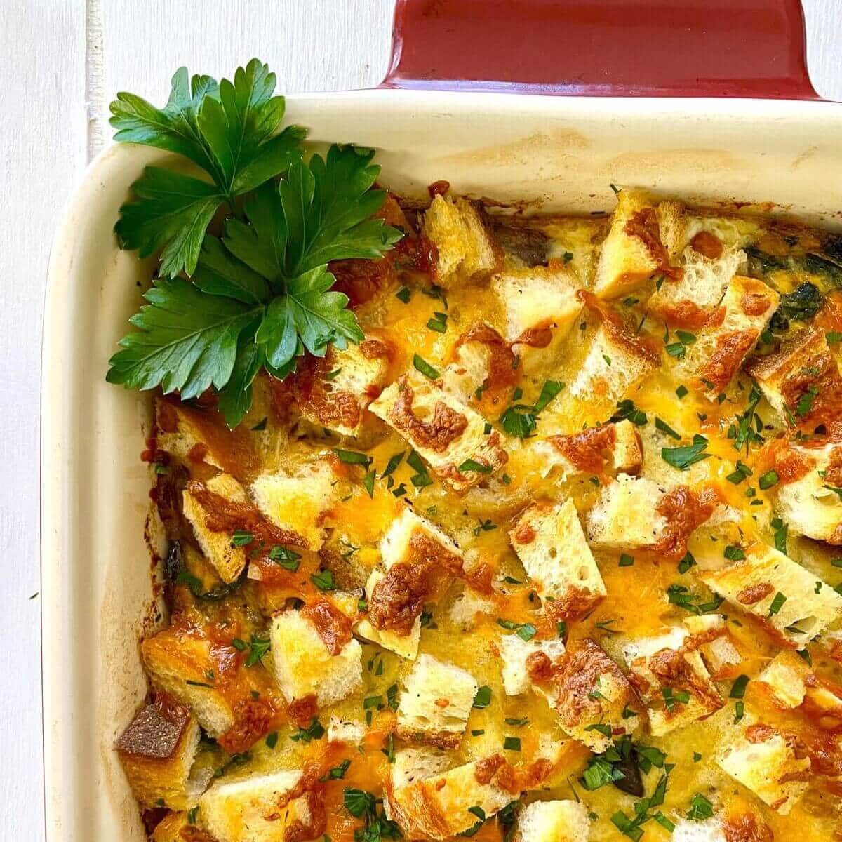 Breakfast Egg Casserole with Croutons, Sausage, Mushrooms and Spinach Recipe