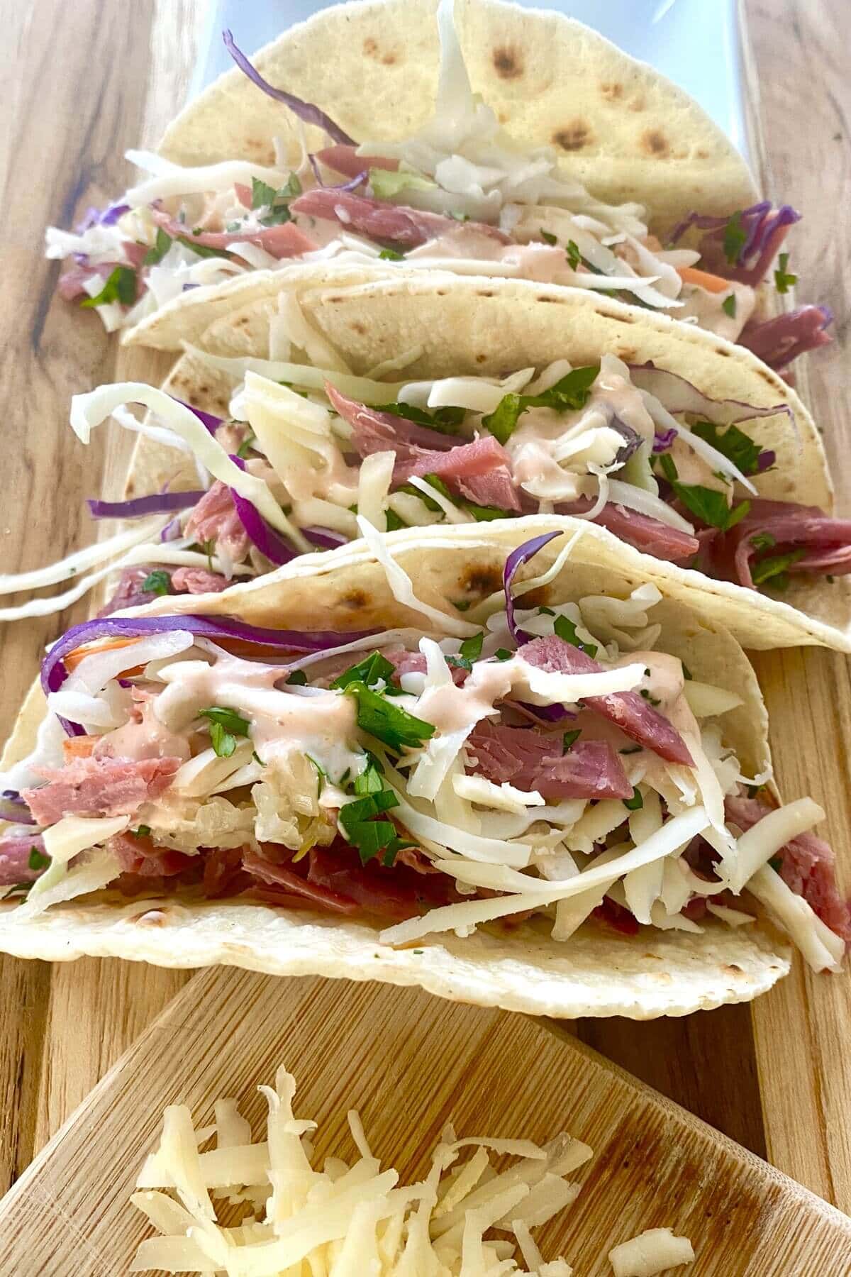 Irish tacos recipe with filled corn tortillas.