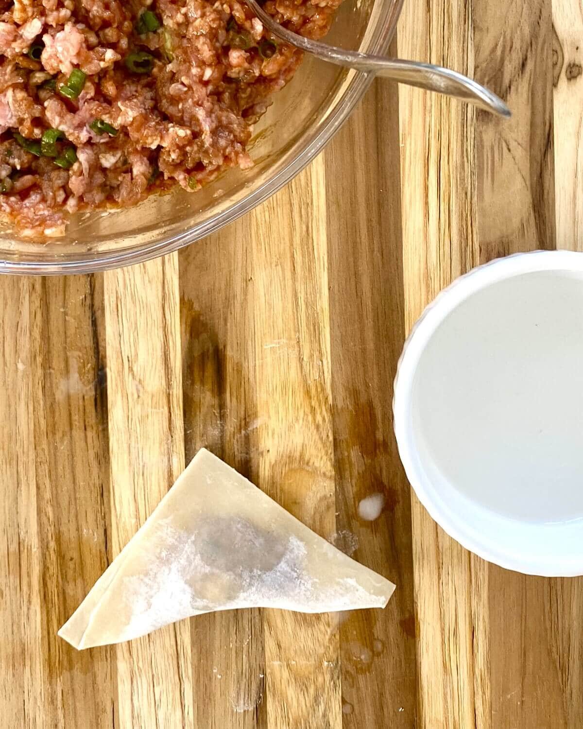 1st fold for pork potstickers.