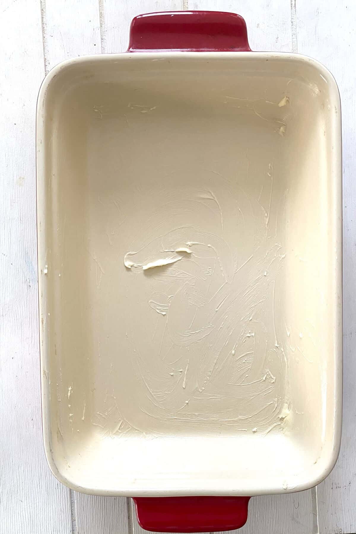 A buttered baking dish.