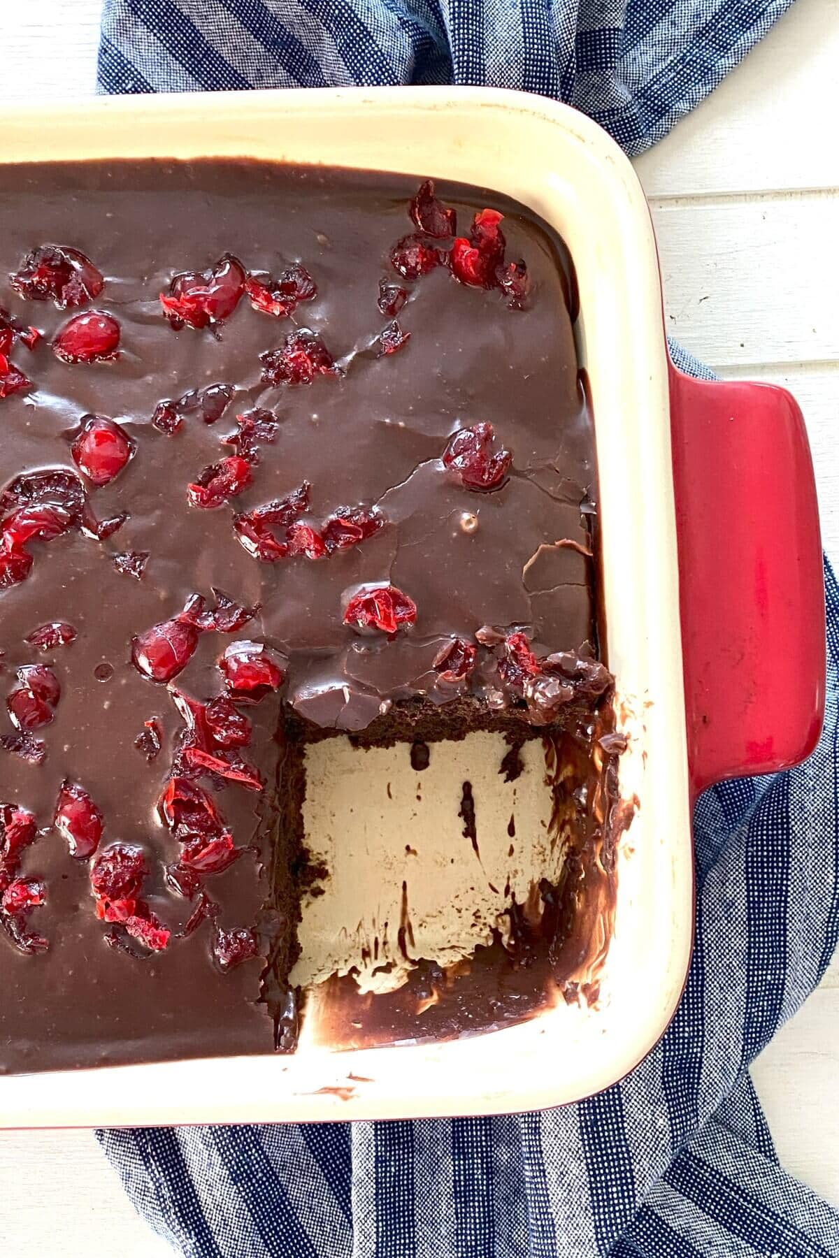 A cake with a piece cut out.