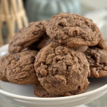 a platter of chocolate chocolate chip pudding cookies.