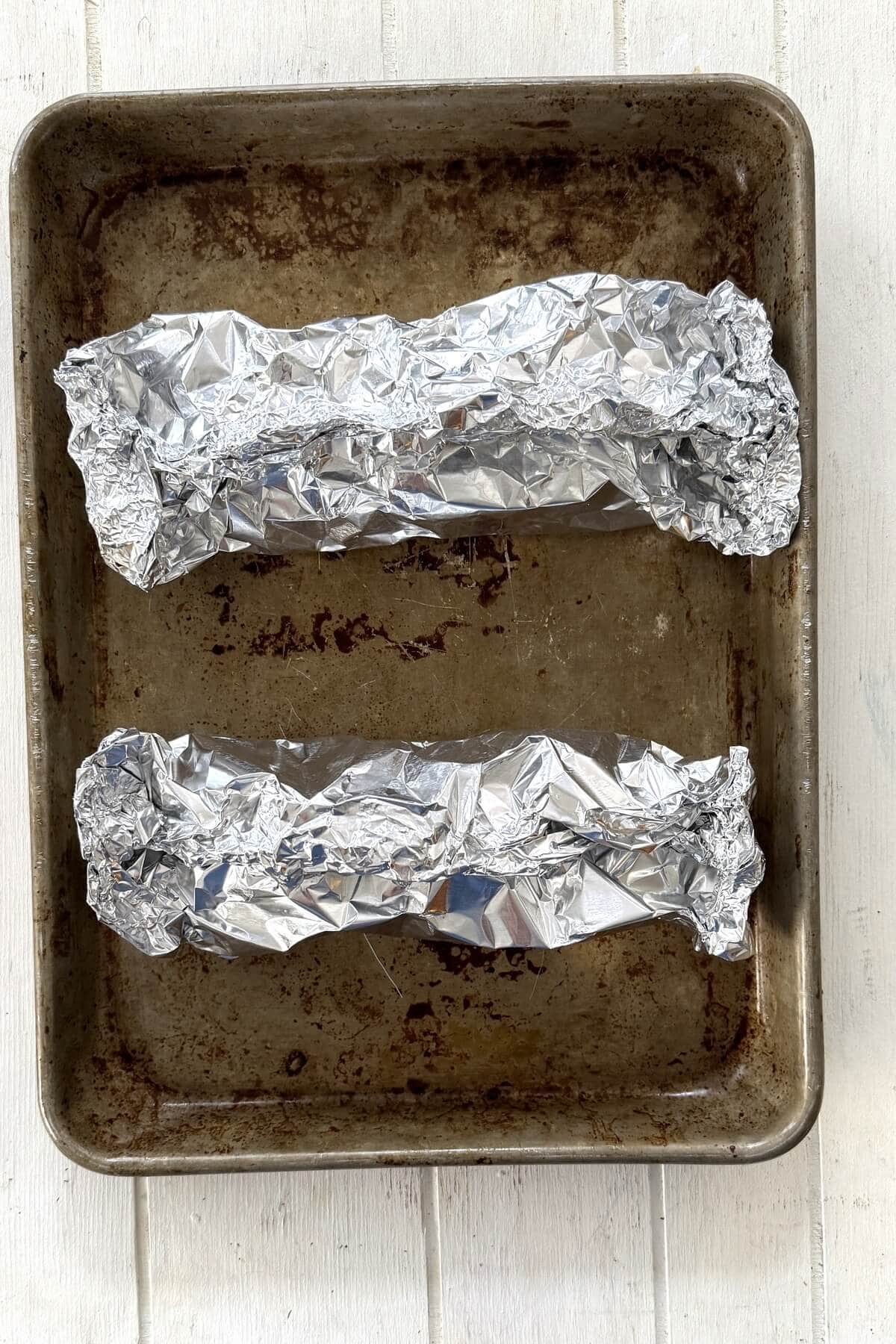 Foil packets with salmon.