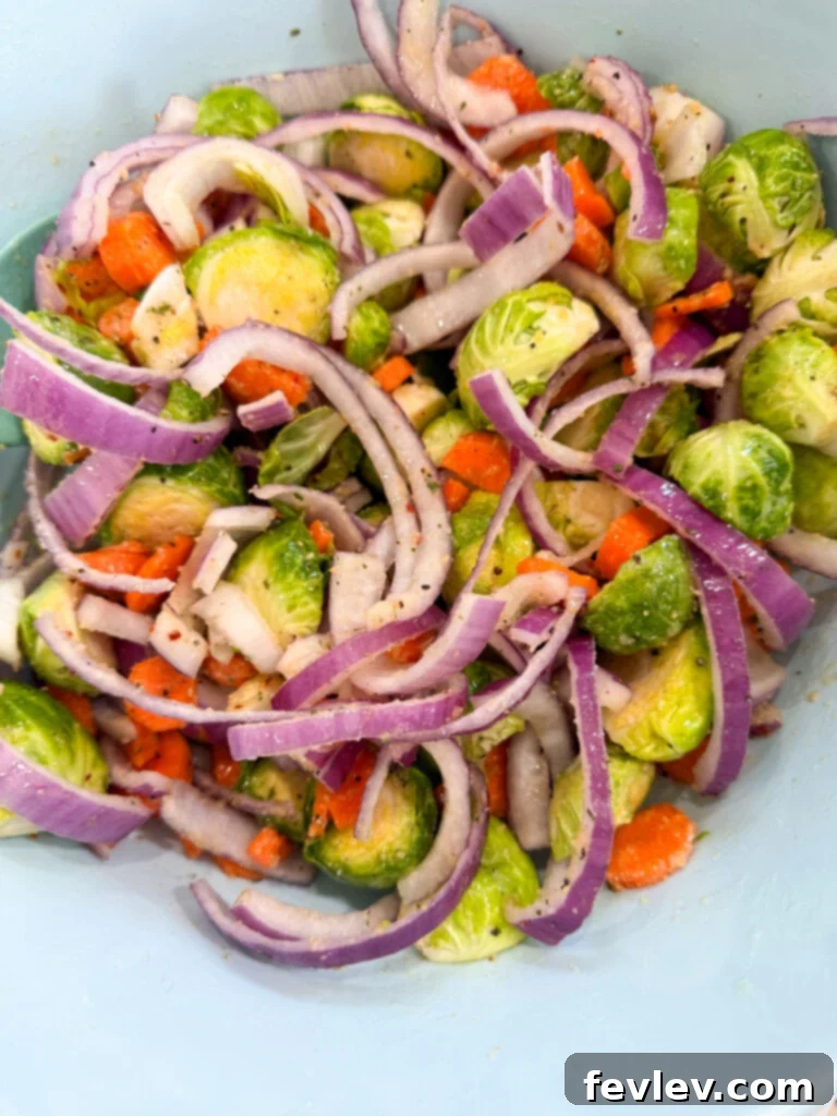 Easy Sheet Pan Sweet Italian Sausage with Roasted Vegetables 6 Prepared vegetables for sheet pan dinner
