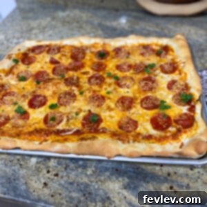 Effortless Sicilian Sheet Pan Pizza 2 Delicious Sheet Pan Sicilian Pizza, thick crust with rich toppings perfect for family dinner