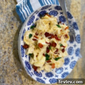 Delicious Bacon Tortellini Alfredo, a perfect 15-minute dinner solution for busy weeknights.