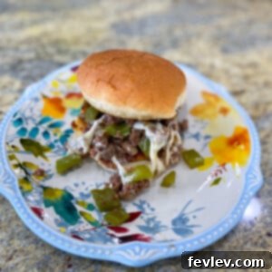 Delicious Philly Cheesesteak Sloppy Joes on toasted buns, ready to eat