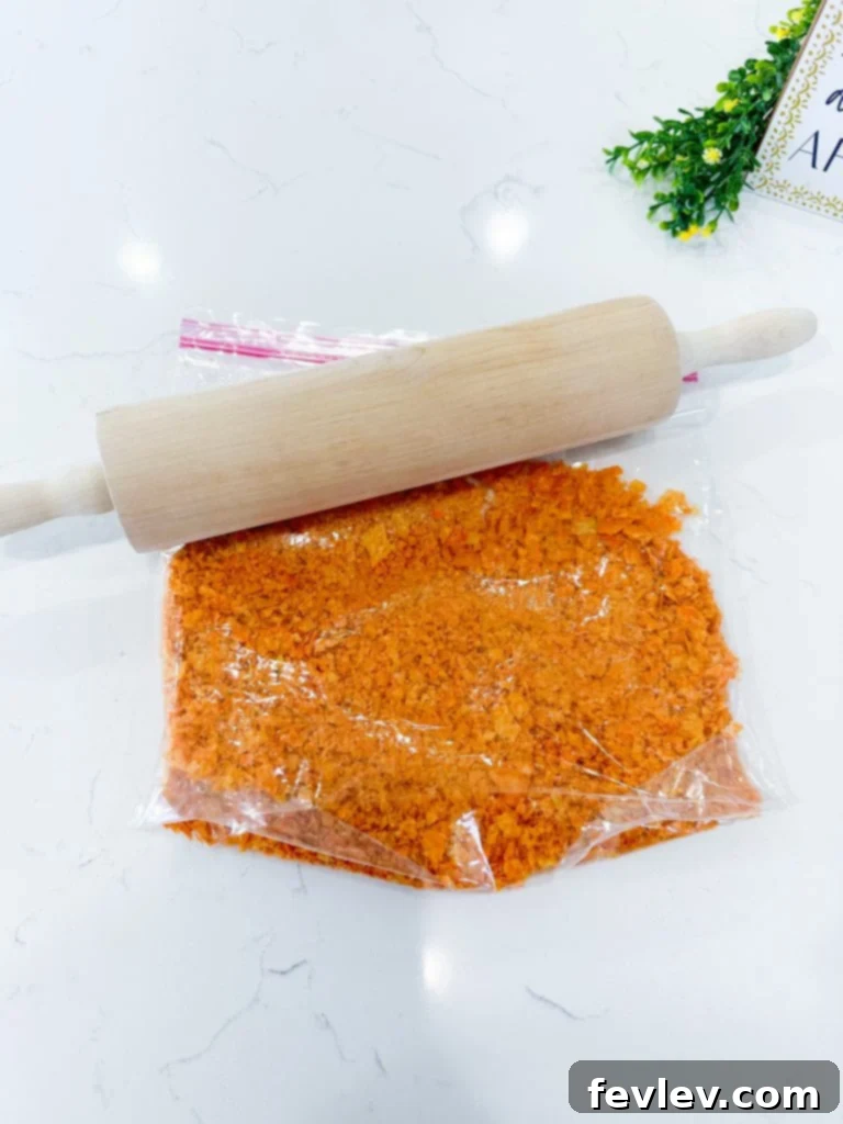 Bold Doritos Crispy Tenders 3 Raw chicken tenderloins ready for breading
