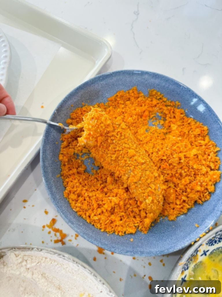 Bold Doritos Crispy Tenders 8 Flour and seasoning mixture in a bowl