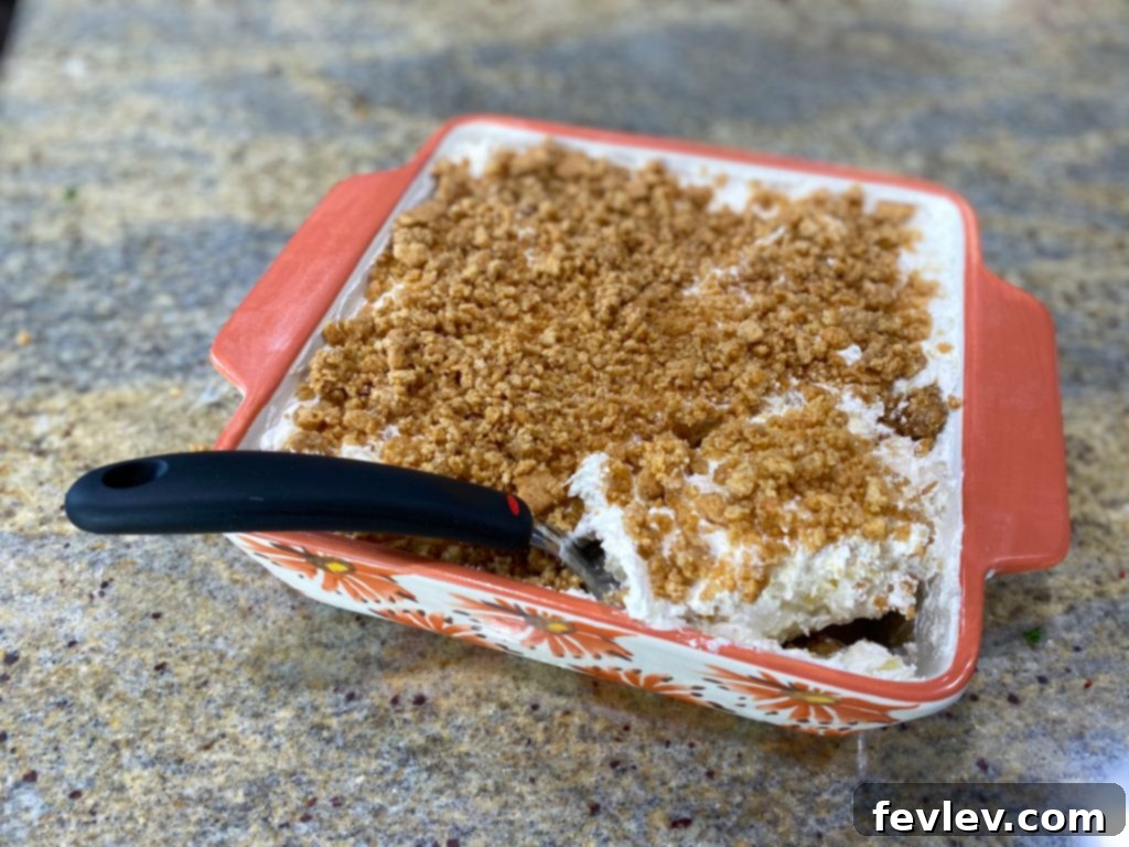 Refreshing No-Bake Pineapple Layered Dessert, showcasing its delightful tropical layers, perfect for a summer gathering