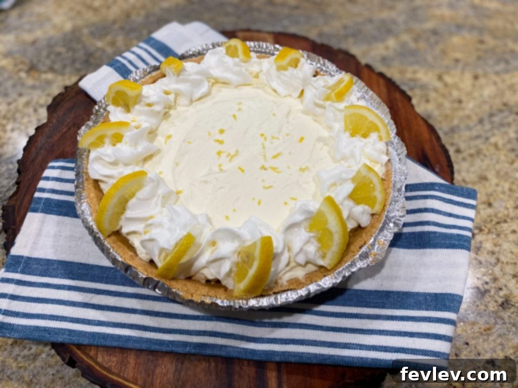 Bright and creamy No-Bake Lemon Cheesecake, with a graham cracker crust and a hint of lemon zest, ideal for a light dessert