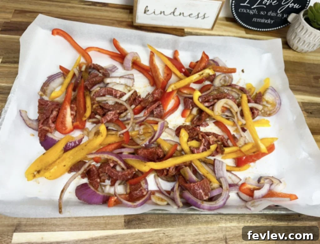 Oven-Baked Steak Fajita Feast 3 easy sheet pan steak fajitas ingredients mixed