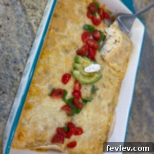 Delicious Creamy White Chicken Enchiladas baked to perfection with a creamy sauce and melted cheese
