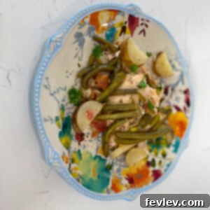 Hearty Slow Cooker Chicken and Bacon with Roasted Vegetables, a perfect easy dinner
