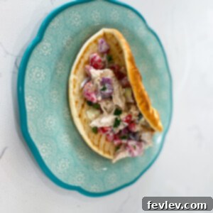 Delicious Greek Tzatziki Chicken served with fresh vegetables