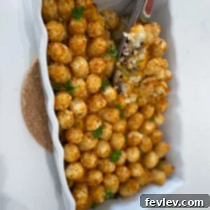 Delicious Easy Tater Tot Casserole with melted cheese and crispy tater tots