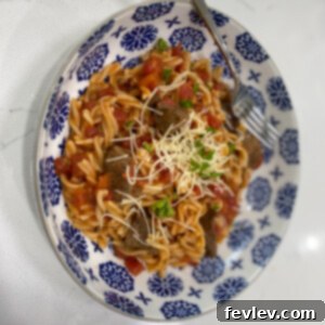 Delicious Sausage Tomato Pasta with juicy sausage and vibrant tomatoes