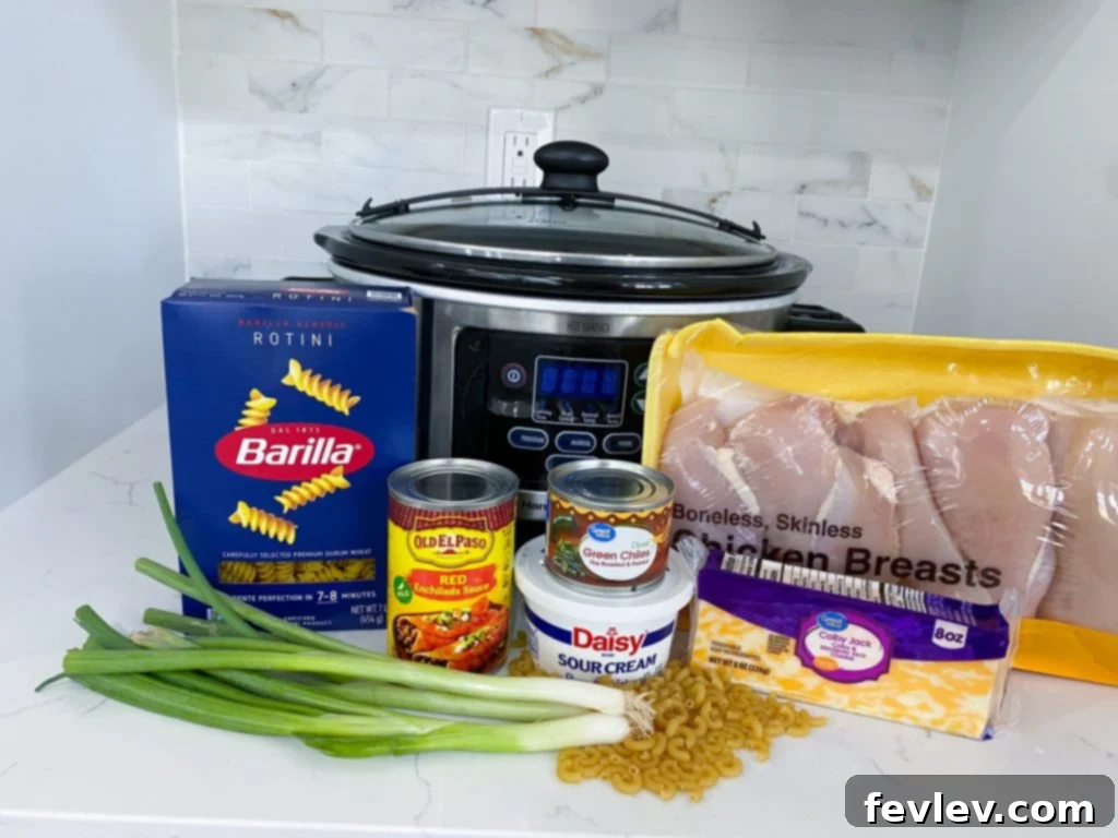 Delicious and cheesy Slow Cooker Chicken Enchilada Pasta, a perfect weeknight meal