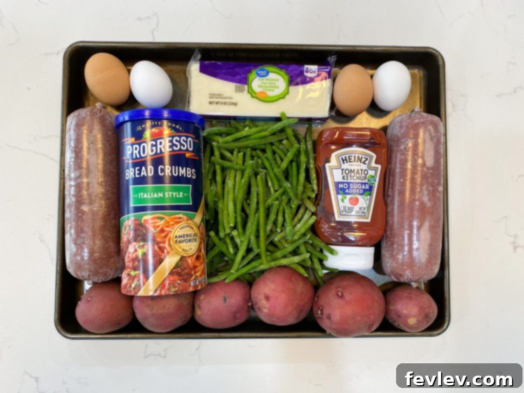 Delicious Sheet Pan Mozzarella Stuffed Meatloaf with Roasted Vegetables