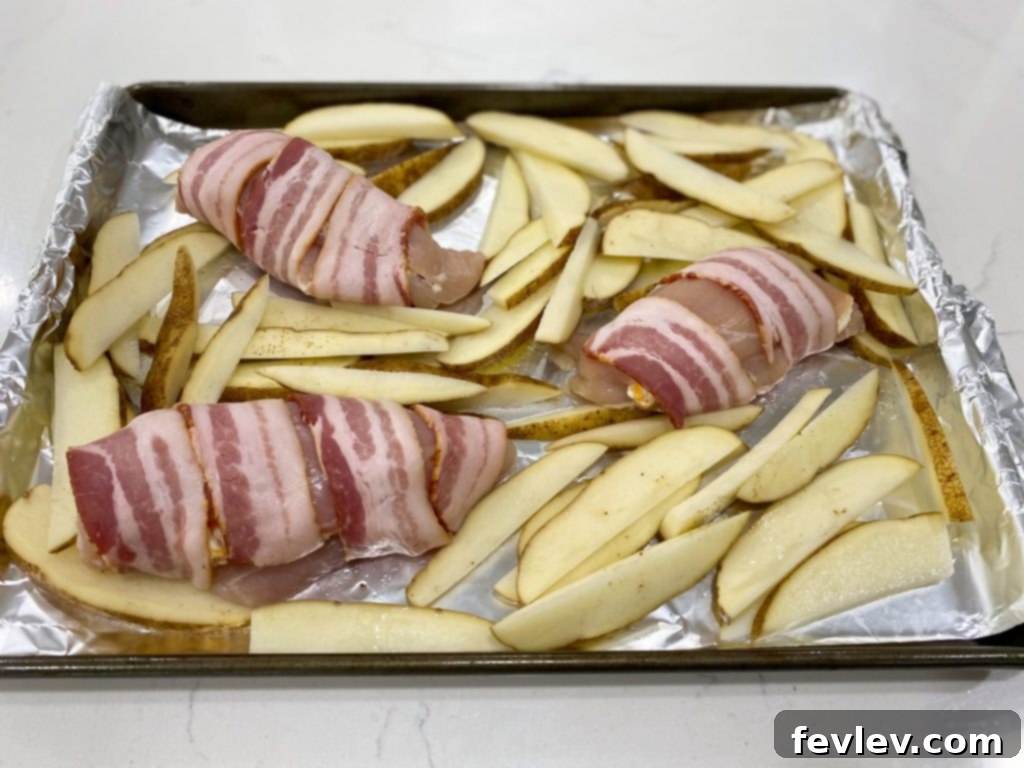 Close-up of ingredients for Bacon Wrapped Stuffed Chicken, including cheeses and spices