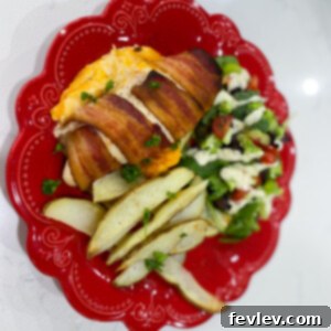 Bacon Wrapped Stuffed Chicken, close-up with melted cheese