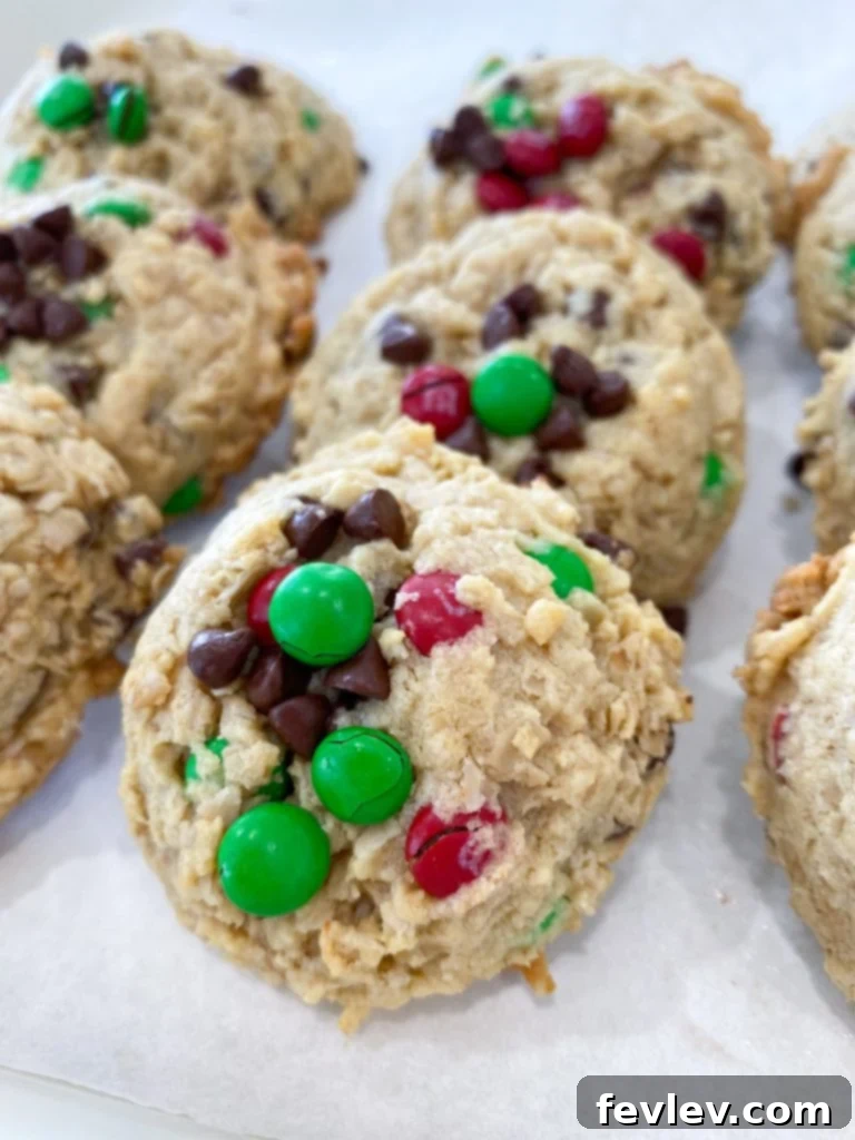 Cake Mix Cookie Monsters 3 A stack of delicious Cake Mix Monster Cookies showing the chewy texture and generous mix-ins.