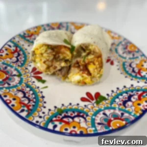 Close-up of a prepared Slow Cooker Breakfast Burrito mixture, ready for scooping into tortillas.
