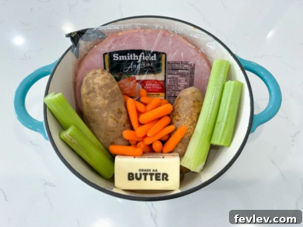 Hearty and creamy Ham and Potato Soup in a rustic bowl, garnished with fresh parsley.