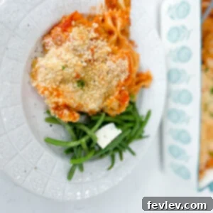 Circular image of a serving of Chicken Parmesan Casserole