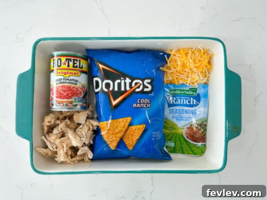 Delicious Dorito Chicken Casserole fresh from the oven, topped with melted cheese and crushed Doritos.