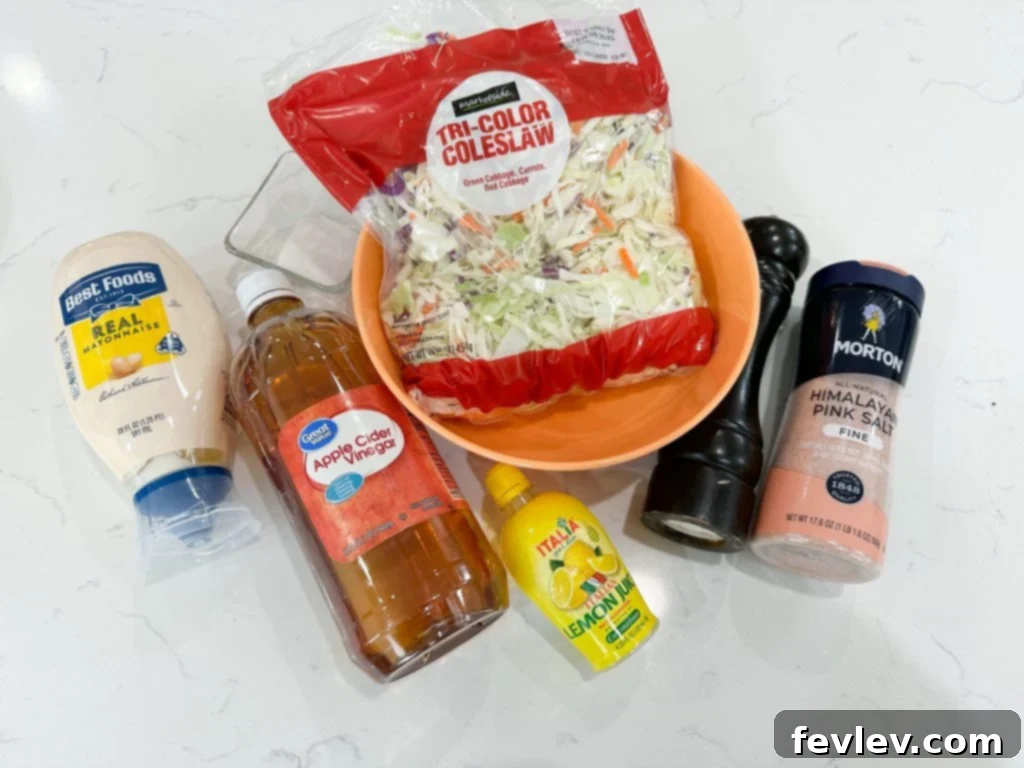 A vibrant, fresh bowl of classic homemade coleslaw, perfectly dressed and ready to serve, highlighting its crunchy texture.