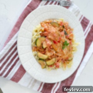 Creamy Chicken Skillet with Tomatoes and Zucchini, beautifully plated.