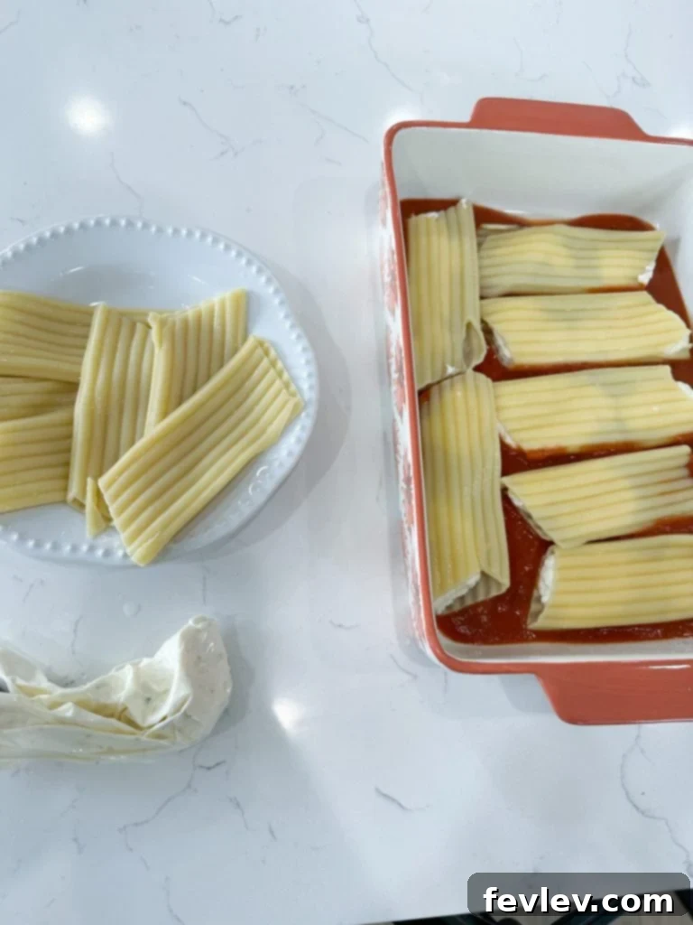 mixing ricotta cheese filling for manicotti