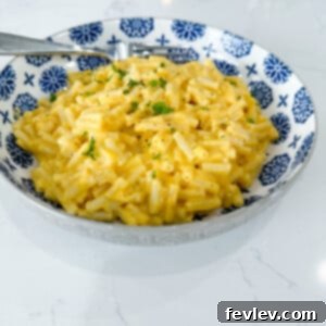 Perfectly creamy Upgraded Boxed Macaroni and Cheese ready to be served, showcasing its golden-brown hue.