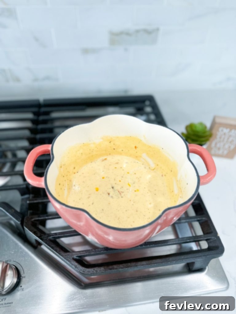 Golden Crescent Chicken with Sun-Dried Tomato Cream 8 Cream, sun dried tomato, Parmesan, and remaining seasonings to a saucepan.